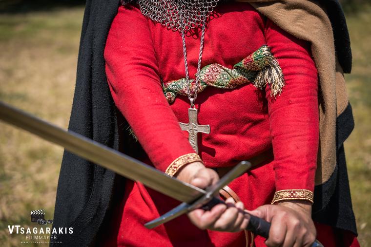Hands holding a sword